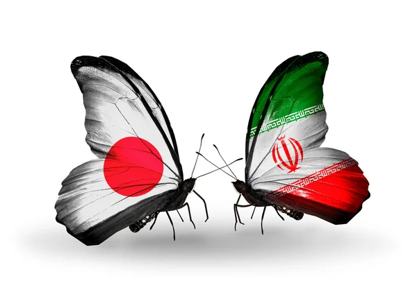 Twee vlinders met vlaggen op vleugels als symbool van betrekkingen japan en iran — Stockfoto