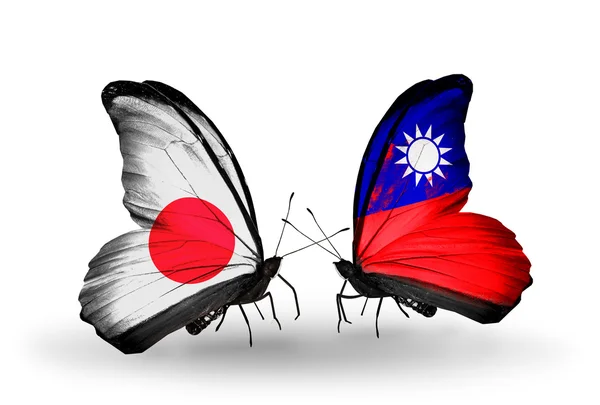 Two butterflies with flags on wings as symbol of relations Japan and Taiwan — Stock Photo, Image