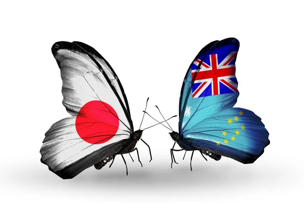 Two butterflies with flags on wings as symbol of relations Japan and Tuvalu — Stock Photo, Image