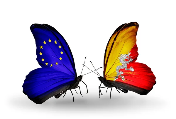 Two butterflies with flags on wings as symbol of relations EU and Bhutan — Stock Photo, Image