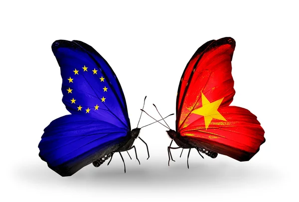 Två fjärilar med flaggor på vingarna som symbol för förbindelserna mellan eu och vietnam — Stockfoto