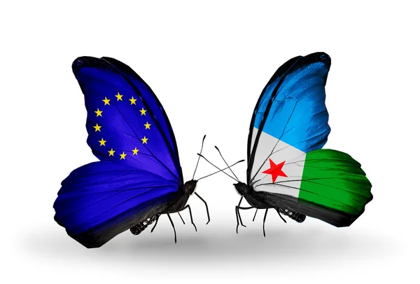 Dwa motyle z flagami na skrzydłach jako symbol stosunków UE i Dżibuti — Zdjęcie stockowe