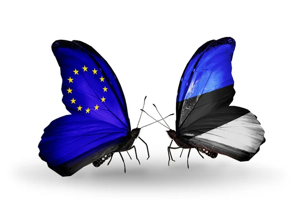 Två fjärilar med flaggor på vingarna som symbol för förbindelserna mellan eu och Estland — Stockfoto