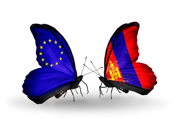 Dwa motyle z flagami na skrzydłach jako symbol stosunków UE i Mongolii — Zdjęcie stockowe