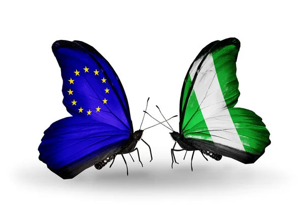 Two butterflies with flags on wings as symbol of relations EU and Nigeria — Stock Photo, Image