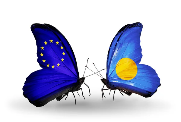 Two butterflies with flags on wings as symbol of relations EU and Palau — Stock Photo, Image