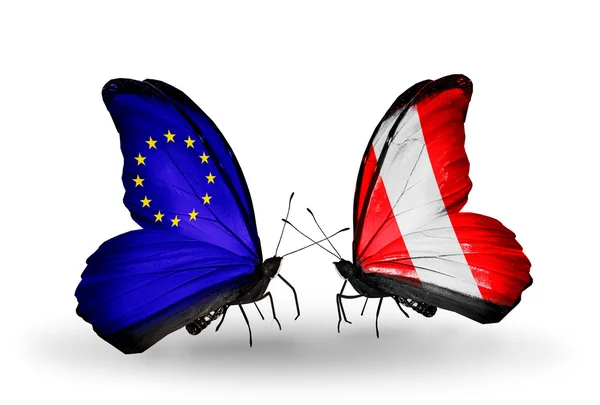 Two butterflies with flags on wings as symbol of relations EU and Peru — Stock Photo, Image