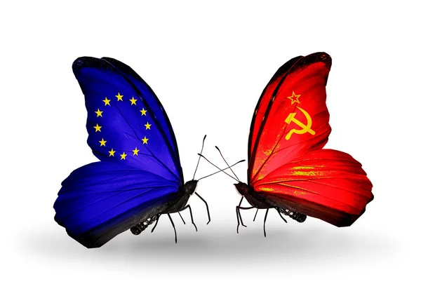 Two butterflies with flags on wings as symbol of relations EU and Soviet Union — Stock Photo, Image