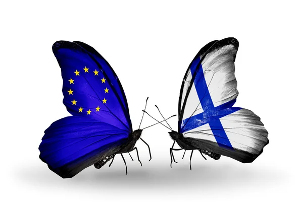 Twee vlinders met vlaggen op vleugels als symbool van betrekkingen eu en finland — Stockfoto