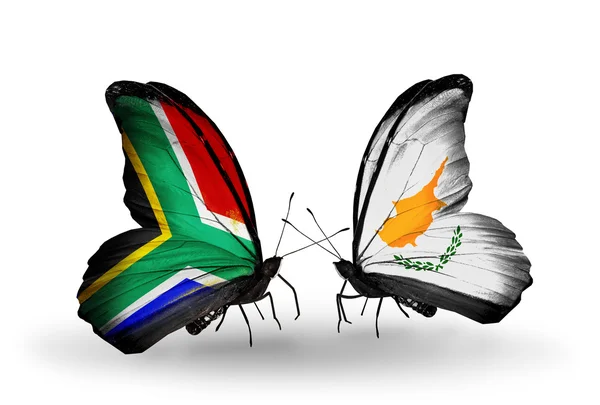 Two butterflies with flags on wings as symbol of relations South Africa and Cyprus — Stock Photo, Image