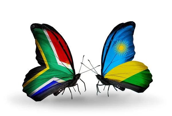 Two butterflies with flags on wings as symbol of relations South Africa and Rwanda — Stock Photo, Image