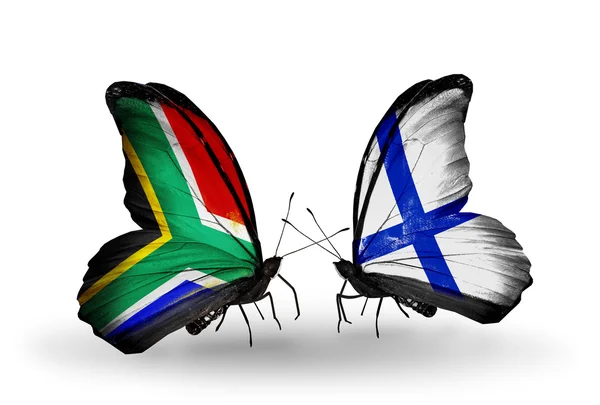 Two butterflies with flags on wings as symbol of relations South Africa and Finland — Stock Photo, Image