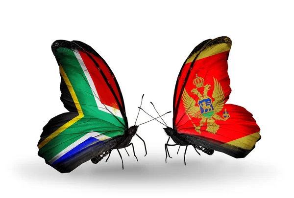 Twee vlinders met vlaggen op vleugels als symbool van de betrekkingen, Zuid-Afrika en montenegro — Stockfoto