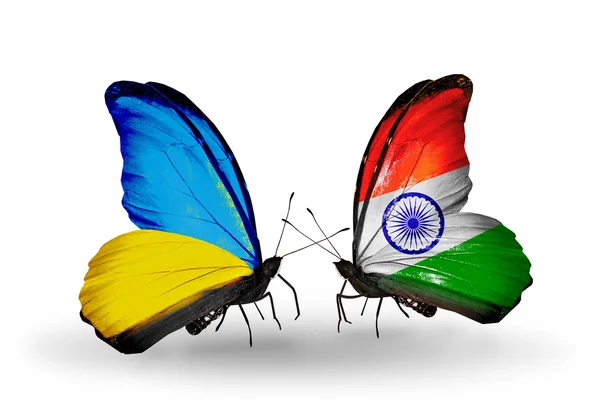 Two butterflies with flags on wings as symbol of relations Ukraine and India — Stock Photo, Image