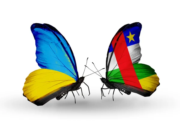 Two butterflies with flags on wings as symbol of relations Ukraine and CAR — Stock Photo, Image