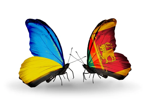Two butterflies with flags on wings as symbol of relations Ukraine and Sri Lanka — Stock Photo, Image