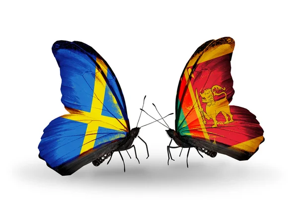 Two butterflies with flags on wings as symbol of relations Sweden and Sri Lanka — Stock Photo, Image