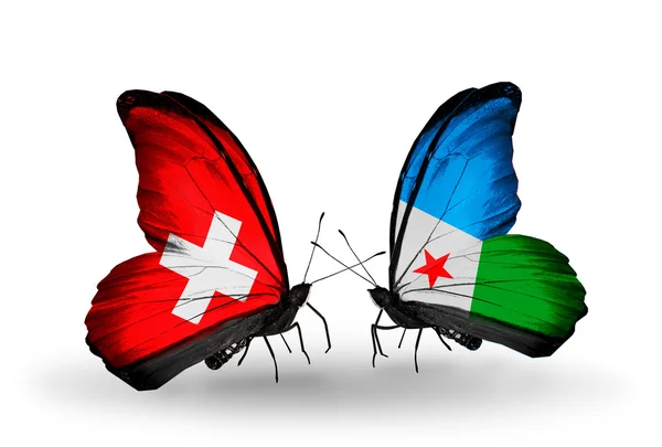 Dos mariposas con banderas de Suiza y Djibouti en alas —  Fotos de Stock