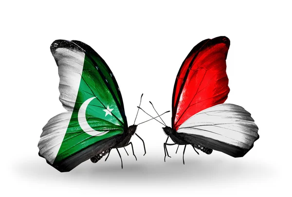 Two butterflies with flags of Pakistan and Monaco, Indonesia on wings — Stock Photo, Image