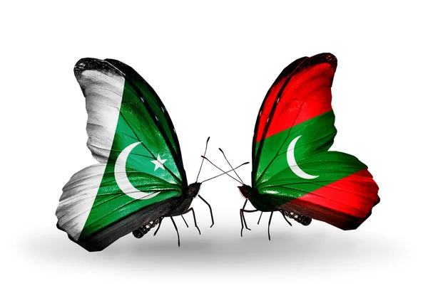 Two butterflies with flags of Pakistan and Maldives on wings — Stock Photo, Image