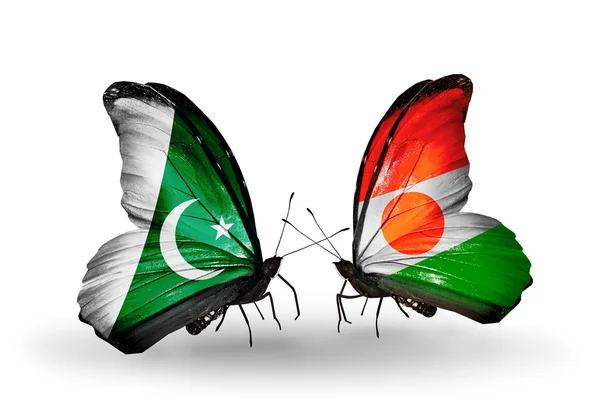 Two butterflies with flags of Pakistan and Niger on wings — Stock Photo, Image