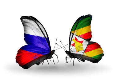 iki kelebek kanatları üzerinde Rusya ve Zimbabve bayrağı ile