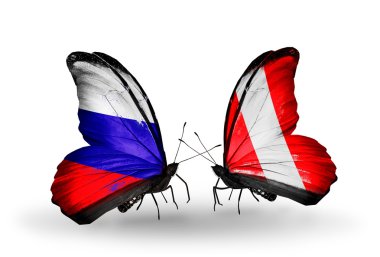 iki kelebek kanatları üzerinde Rusya ve peru bayraklı