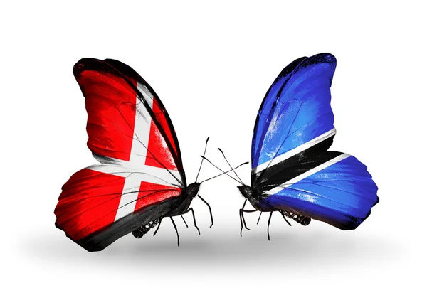 Two butterflies with flags of Denmark and Botswana on wings — Stock Photo, Image