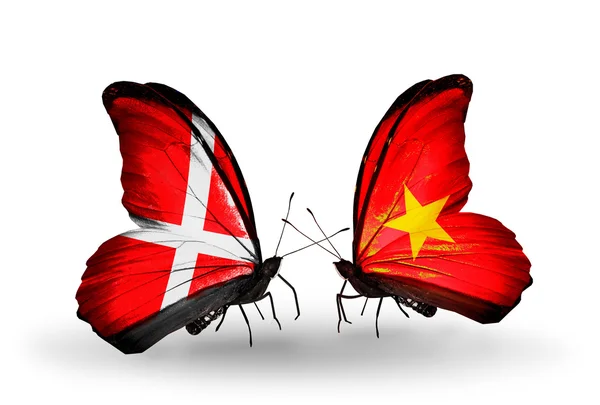 Two butterflies with flags of Denmark and Vietnam on wings — Stock Photo, Image