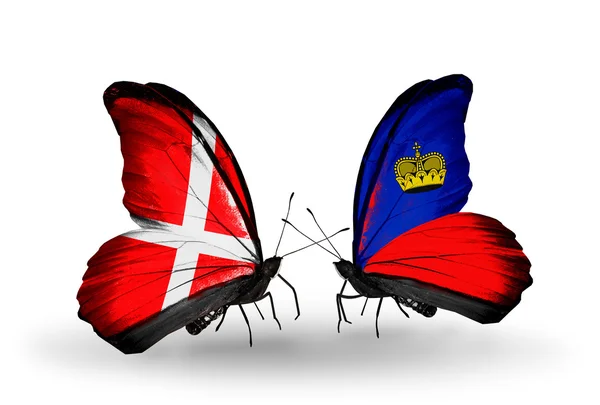 Two butterflies with flags of Denmark and Liechtenstein on wings — Stock Photo, Image