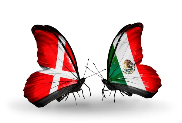 Two butterflies with flags of Denmark and Mexico on wings — Stock Photo, Image