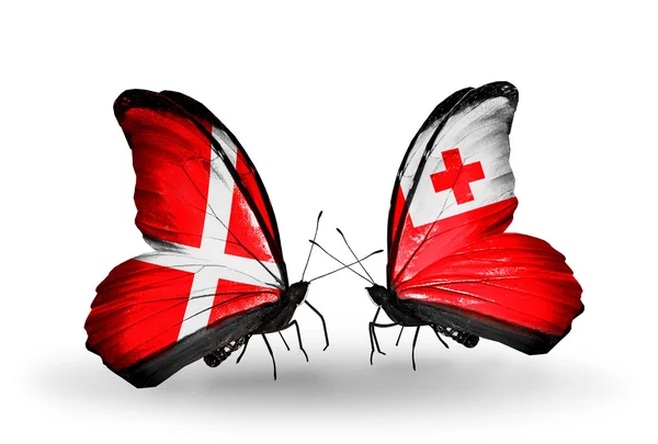 Two butterflies with flags of Denmark and Tonga on wings — Stock Photo, Image