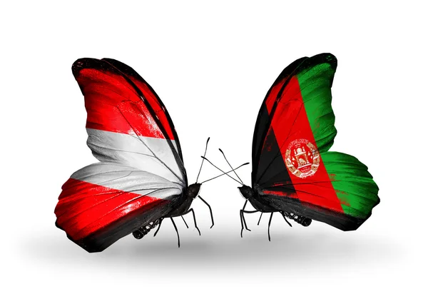 Két pillangók, zászlókkal, Ausztria és Afganisztán a szárnyak — Stock Fotó