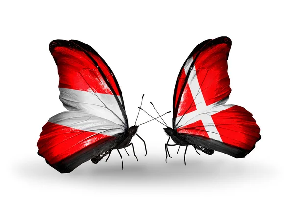 Two butterflies with flags of Austria and Denmark on wings — Stock Photo, Image