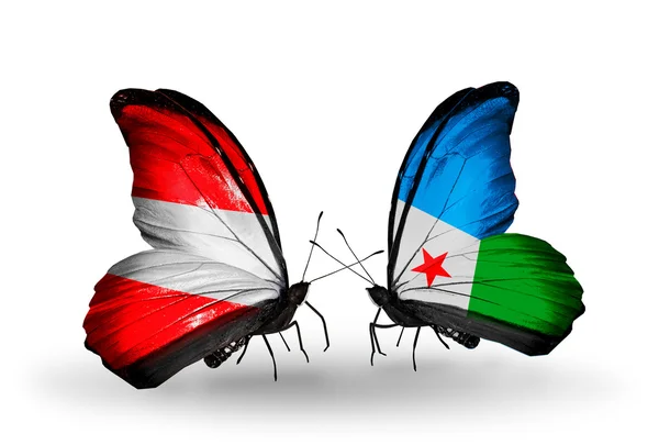 Two butterflies with flags of Austria and Djibouti on wings — Stock Photo, Image