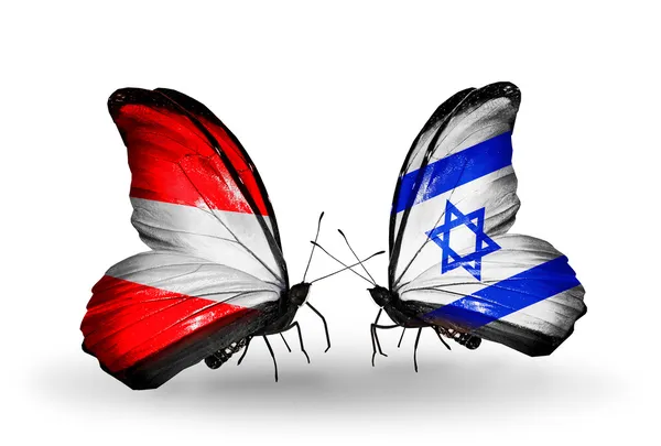 Dwa motyle z flagami Austrii i Izrael na skrzydłach — Zdjęcie stockowe