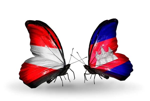 Dos mariposas con banderas de Austria y Camboya en alas — Foto de Stock