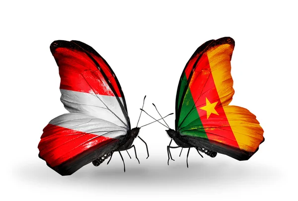 Two butterflies with flags of Austria and Cameroon on wings — Stock Photo, Image