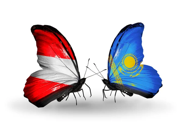 Two butterflies with flags of Austria and Kazakhstan on wings — Stock Photo, Image