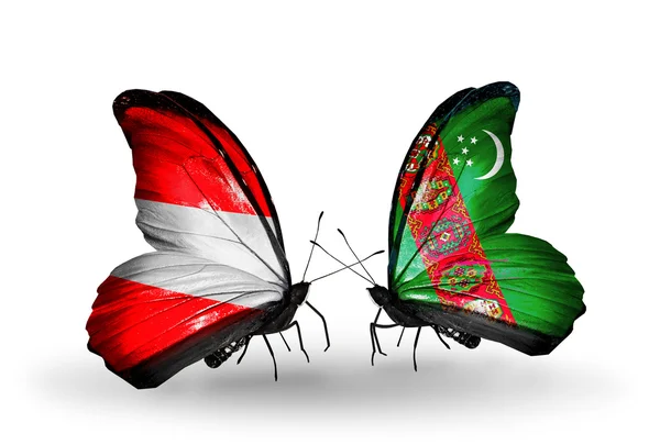 Dos mariposas con banderas de Austria y Turkmenistán en alas —  Fotos de Stock