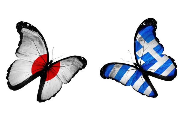Dos mariposas con banderas de Japón y Grecia ondeando —  Fotos de Stock