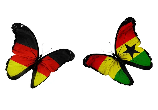 Dva motýli s Německem a ghana vlajky vlají — Stock fotografie