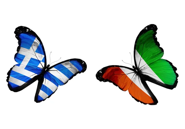 Dos mariposas con banderas de Grecia y Costa de Marfil ondeando — Foto de Stock