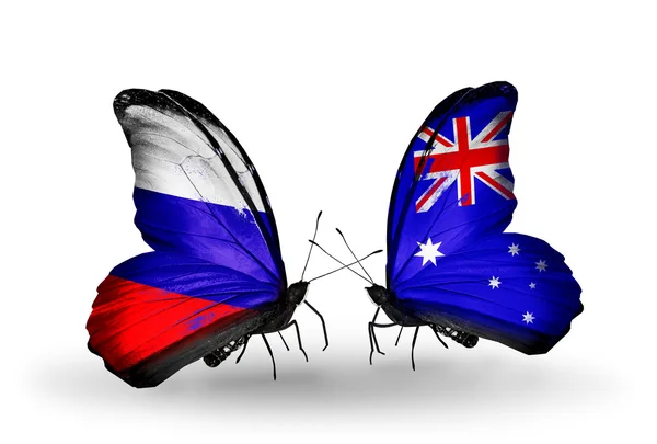 Dos mariposas con banderas de Rusia y Australia en alas — Foto de Stock