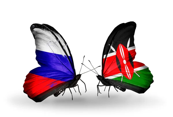 Dos mariposas con banderas de Rusia y Kenia en alas — Foto de Stock