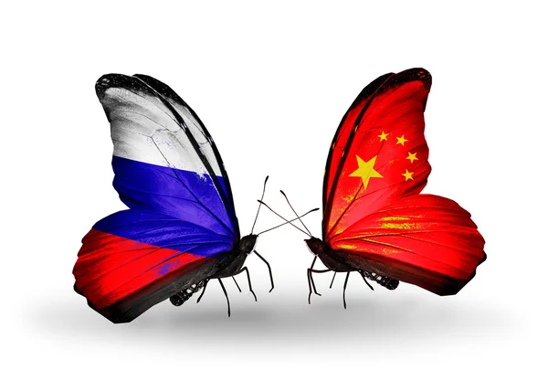 Two butterflies with flags of Russia and China on wings — Stock Photo, Image