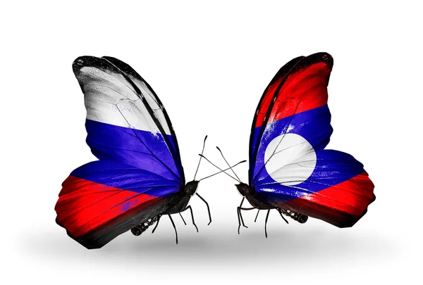 Dos mariposas con banderas de Rusia y Laos en alas — Foto de Stock