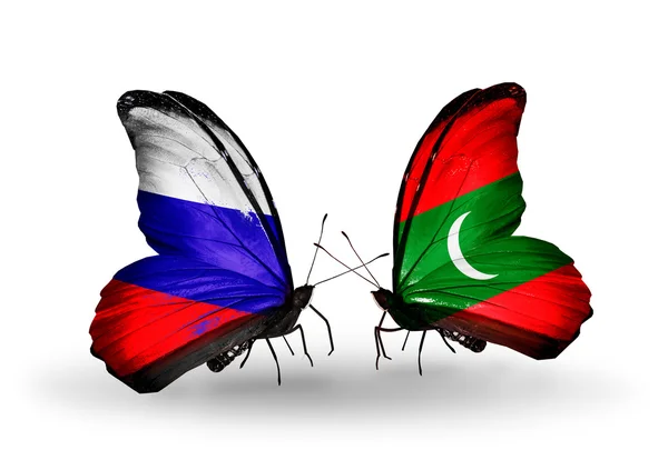 Two butterflies with flags of Russia and Maldives on wings — Stock Photo, Image