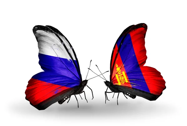 Dos mariposas con banderas de Rusia y Mongolia en alas — Foto de Stock