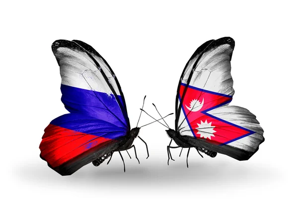 Two butterflies with flags of Russia and Nepal on wings — Stock Photo, Image